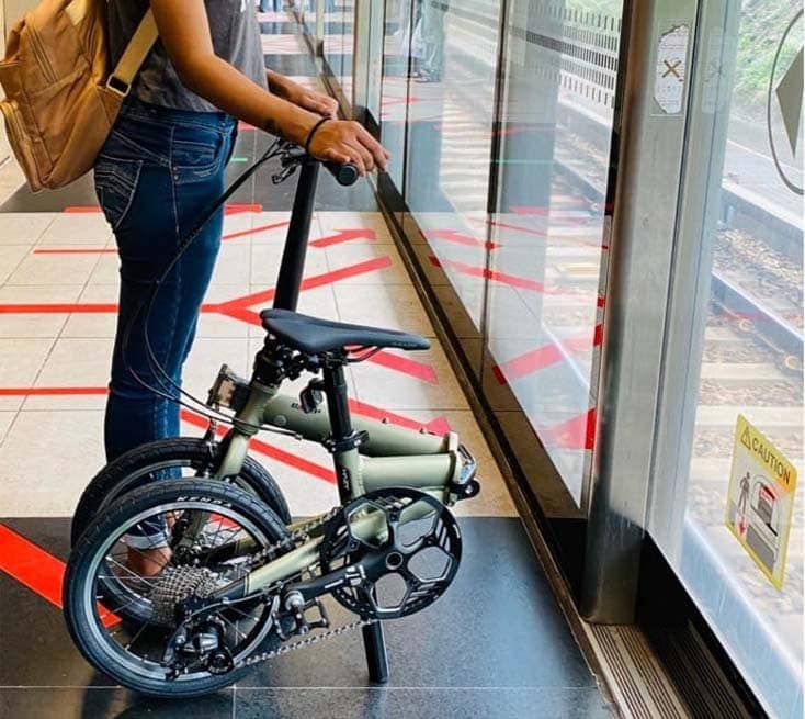 camplite girl going into mrt folding bike 1 - Top choice for a Lightweight folding bike  - CAMP LITE Folding bicycle (review by customer)