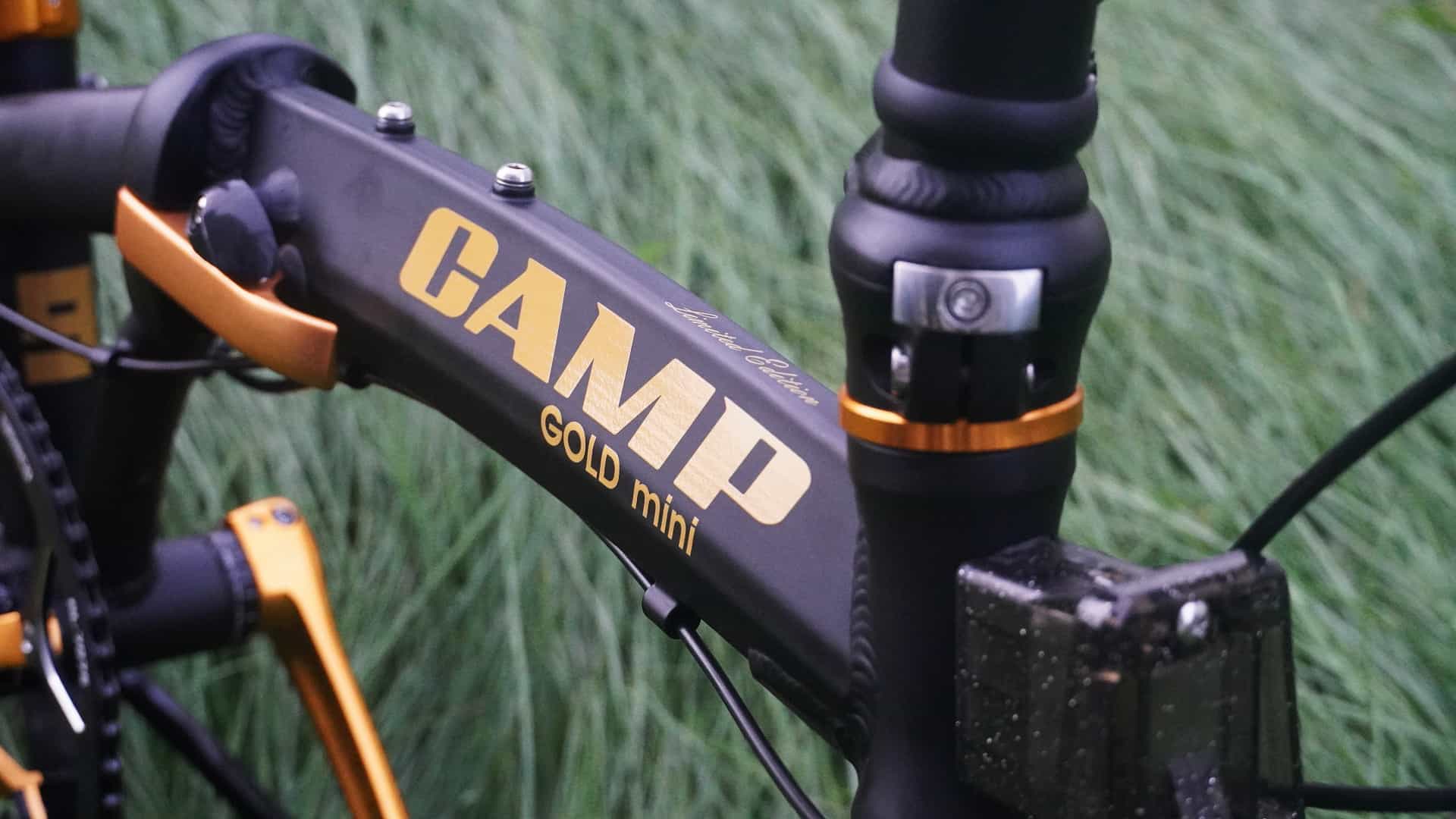CAMP GOLD Mini (BLACK) foldable bicycle on grass patch (2)